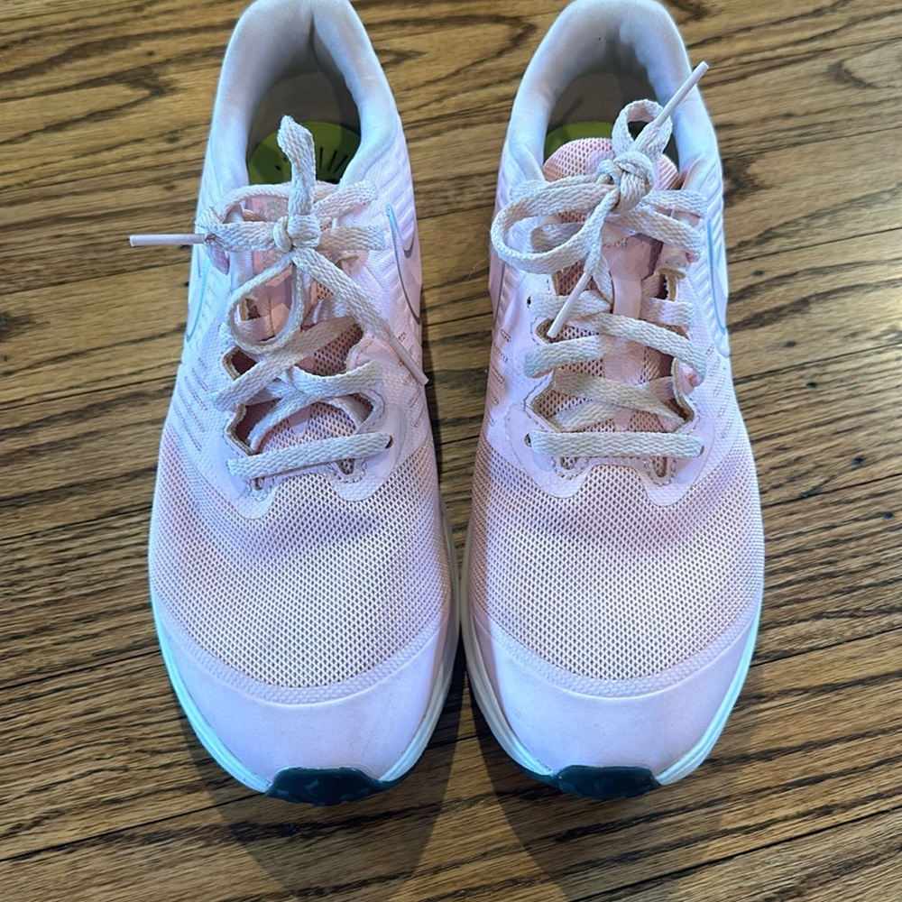 Light pink Nike star runner
